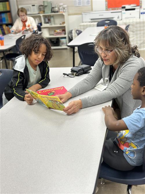 Mentor reading to students