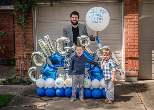 picture of Mr. Stavinoha with his kids with his FBISD teacher of the year balloons. picture of Mr. Stavinoha with his kids with his FBISD teacher of the year balloons.