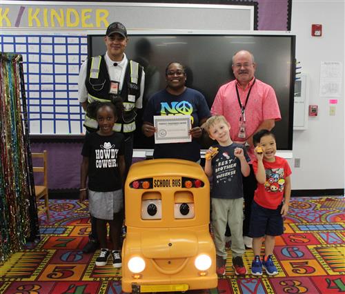Buster, students and staff