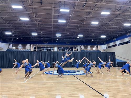 Photo of dance team performing contemporary routine