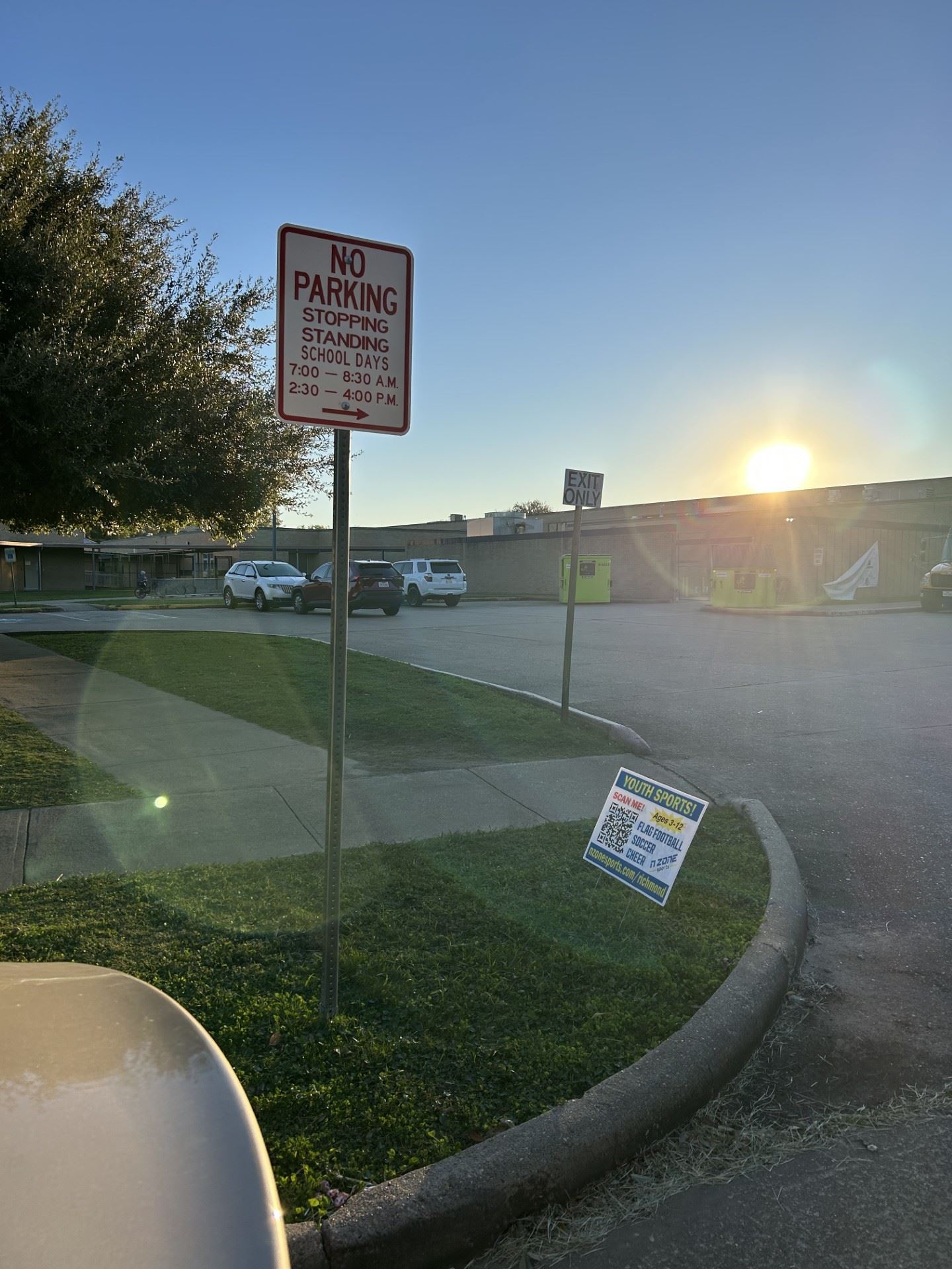  No parking sign 7:30-8:30am. and 2:30-4:00pm.
