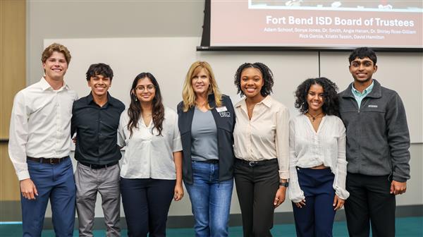 SL102 with Board President Kristin Tassin at the SL102 Capstone Presentations at UH Sugar Land